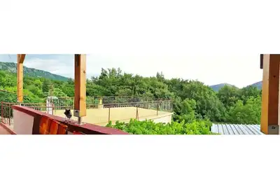 Image de 2-bedroom apartment with living room and kitchen in peaceful natural surrounding
