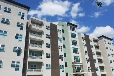 Image de Central apartment Located across from the National Stadium with Gym & Tennis Crt