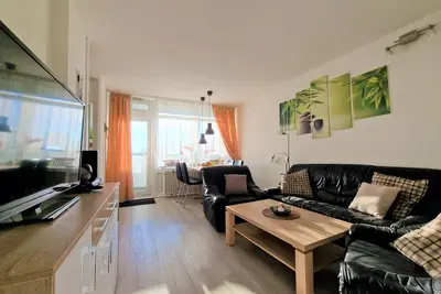 Image de Sunny and well-kept apartment, completely covered with light Pvc laminate,