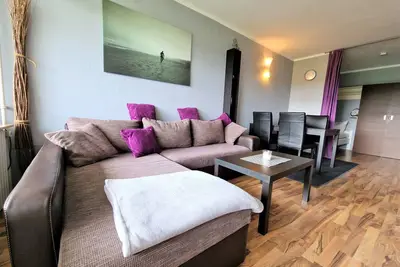 Image de Beautiful and harmoniously coordinated apartment with balcony overlooking the park-like