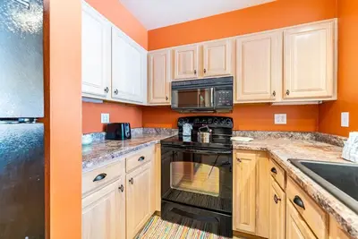 Ideally Located Lakeside Condo w/ Mountain & Lake Views from Private Balcony!