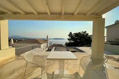 Seafront architectural villa in exclusive Aghios Emilianos. Incredible views!