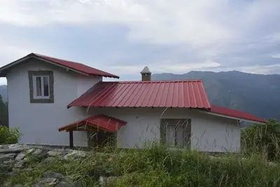 Image de The Whisteling Cottage