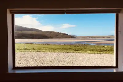 Overlooking the Kyle of Durness with an ever changing tideline. Pet friendly!