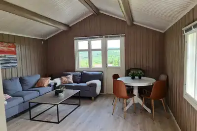 Image de 4 pers. chalet avec une vue fantastique au milieu d'un environnement naturel.