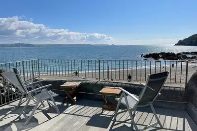 Spacious light cosy beach front house with balcony overlooking the sea