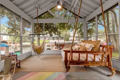 Image de Waterfront Home on Lake Conroe with a private dock and covered boat lift.