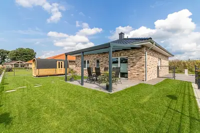 Image de Vacation home for 6 guests with sauna, fireplace and lake view in Walchum