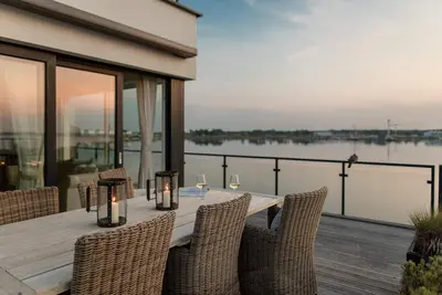 Image de Zweite Heimat - 1st row by the water, 1st floor, sauna, full bath, balcony, beach chair