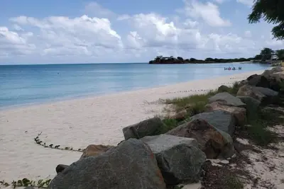 Image de Start your adventure with us on Runway's White Sandy Beach.