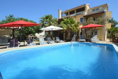 Image de Bel appartement pour 6 personnes avec Wifi, piscine, climatisation, Tv, patio et parking