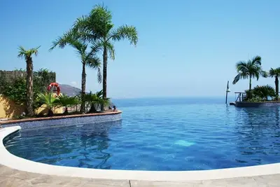 Image de Appartement \"Casa Tranquila\" avec vue sur la mer et la montagne, piscine et terrasse partagées