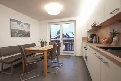 Image de 70m² modern holiday apartment with balcony, free swimming lake, 100 m from the ski area