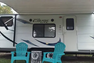 Image de Camper near pool at Pebble Hill Rv Resort
