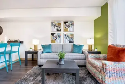 New 2mi→Downtown, Balcony + Rooftop Views, Fast Wi-Fi, W/D included.