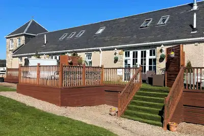 Image de Greenknowes Lodge with Hot Tub & Stove