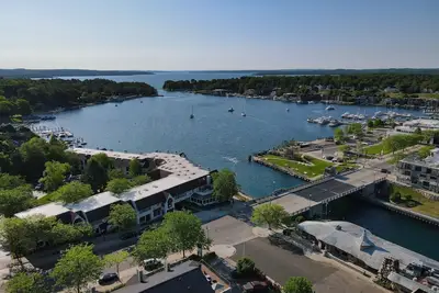 Image de 110ewi Peaceful Lakeview Retreat | Downtown Charlevoix | Pool, Hot Tub, Sauna