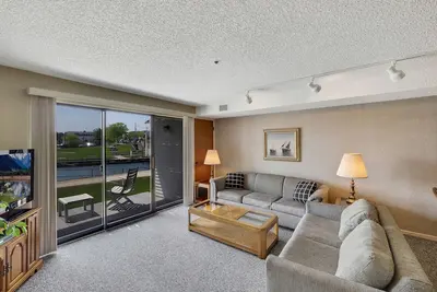 Image de Edgewater #119 | Water Views + Private Balcony | Pool, Hot Tub, Sauna | Patio