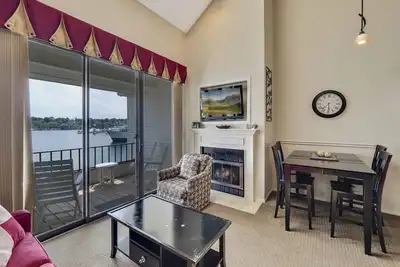 Image de Two-Bedroom Vaulted Retreat | Downtown Charlevoix | Pool, Hot Tub, Sauna