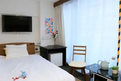 Image de Nonsmoking Triple room with bathroom and toilet Up to 4 people Sakuragawa Riverside Hotel / Osaka Ōsaka