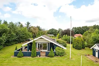 Image de Maison de vacances pour 6 a Oksbøl-By Traum