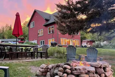 Image de Adirondack Hideout, lakefront location and sandy shoreline