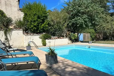 Image de Maison de caractère avec piscine saisonnière située dans une belle campagne