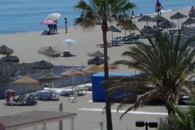 Image de Appartement de luxe à Los Boliches près de la plage avec piscine partagée et Wi-Fi