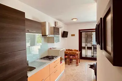 Image de Appartement de vacances au rez-de-chaussée, climatisé, avec une grande belle terrasse et vue mer