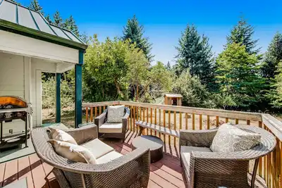 Darling Cottage in the Trees w/ Free WiFi, Full Kitchen, Wood Stove, & Gas Grill