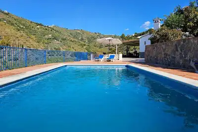 Image de Maison de vacances \"Cortijo Airen\" avec piscine, vue sur la montagne et Wi-Fi