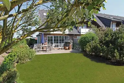 Image de Half of the house for up to 6 people with garden.
