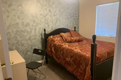 Image de Two guest rooms in a shared home.