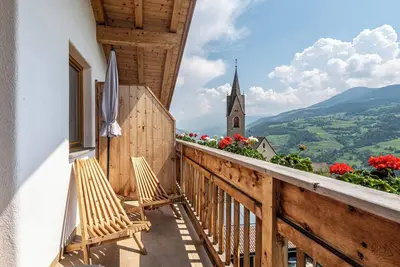 Image de Appartement de vacances \"Dolomiten Winklerhof\" avec vue sur montagne, jardin et Wi-Fi