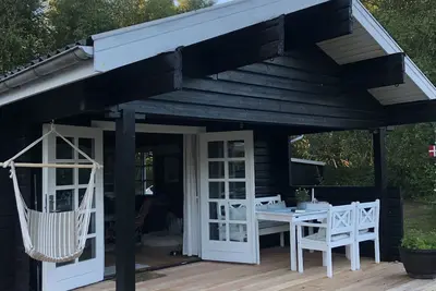 Image de Lovely log house next to protected plantation