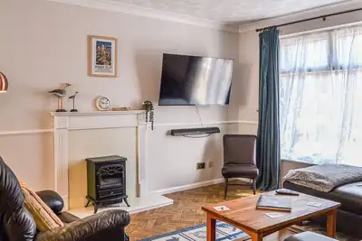 Image de The Sandpiper just a few hundred yards from the beach and has off street parking.