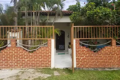 Image de House facing the sea and close to the central square in the village of Cumuruxatiba.