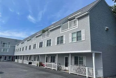 Image de 20981 Coastal Highway #12- Beach Club- Dog friendly town home with a pool and walking distance to beach!