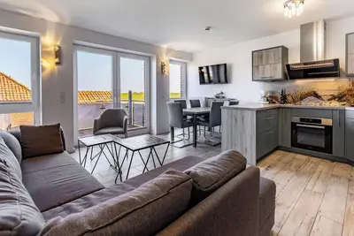 Image de Haus Kiek in't Watt vacation apartment Hellerblick 2 with fantastic balcony on Juist