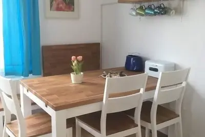 Image de Cozy vacation apartment very close to the beach!