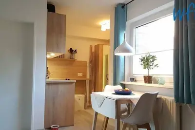 Image de Close to the beach and cozy - vacation apartment for three people!