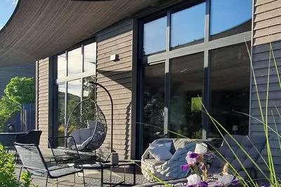 Image de 5* Odenwald Lodge with infrared sauna and \"Haus Purpur\" e-charging station