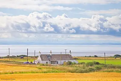 Image de Beachcombers - a cottage that sleeps 12 guests in 6 bedrooms