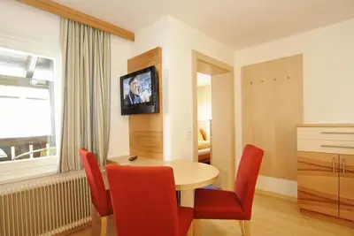 Image de Double room with balcony (east) - Pension-Appartements Bergkristall