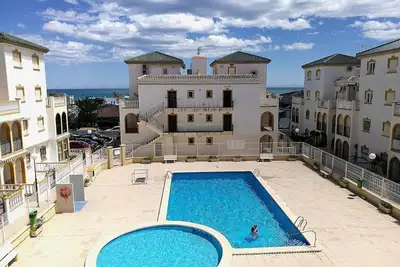 Image de Appartement Casa Cozy avec vue sur mer, piscine, Wi-Fi, climatisation et terrasse
