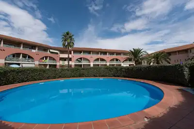 Image de Arinella - Studio avec piscine vue mer à 2 min à pied de la plage