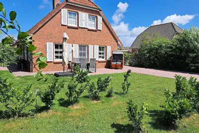 Image de Maison de vacances Neßmersiel pour 1 - 6 personnes avec 3 chambres à coucher - Maison de vacances