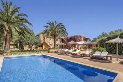 Image de Maison de vacances Casa Es Torrent avec vue sur les montagnes, piscine, Wi-Fi, jardin et terrasse