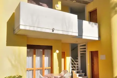 Image de Joli appartement avec climatisation, piscine, Tv, terrasse, animaux admis et parking