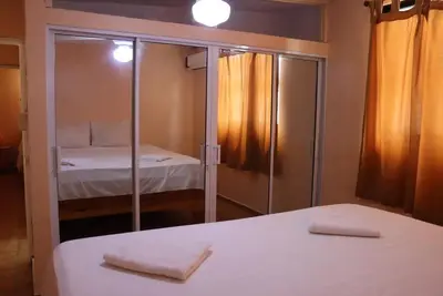 Image de Apartment 2: Beachside 2-Bedroom Apartment with Balcony & Fully Equipped Kitchen